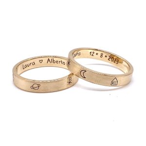 Alianzas de boda oro amarillo plana con grabación externa dibujos